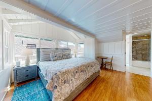a bedroom with a bed and a window at Seabright in Santa Cruz