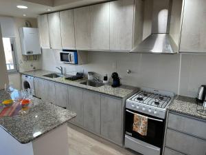 Küche/Küchenzeile in der Unterkunft ML SUR Departamento