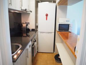 Kuchyňa alebo kuchynka v ubytovaní Espectacular apartamento en el corazón de Calella!