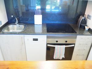 Kuchyňa alebo kuchynka v ubytovaní Espectacular apartamento en el corazón de Calella!