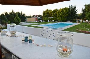 The swimming pool at or close to Dimeon Villa