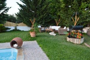 A garden outside Dimeon Villa