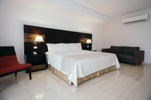 Letto o letti in una camera di Hotel Balandra