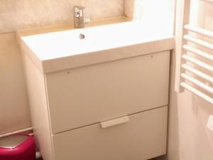 a bathroom with a sink and a drawer at Appartement Huez, 2 pièces, 4 personnes - FR-1-405-173 in L'Alpe-d'Huez