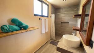 Koupelna v ubytování Family & Couples HARMONIA Suites in Tulum + 37 fotografií