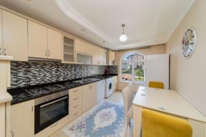 Cuina o zona de cuina de Lovely Flat with Shared Pools in Alanya
