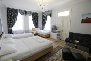Postel nebo postele na pokoji v ubytování ApartHotel RioNi