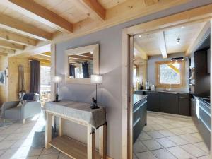 A kitchen or kitchenette at Chalet Le Grand-Bornand, 7 pièces, 11 personnes - FR-1-391-91