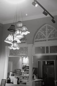 a kitchen with a chandelier in the middle of it at Autentic villa at the sea coast in Haifa