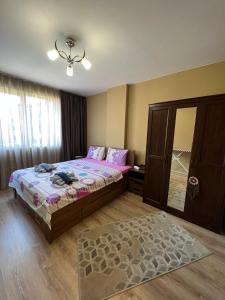 Ein Bett oder Betten in einem Zimmer der Unterkunft Johannesburg Spacious Family apt w Free Parking and Playground