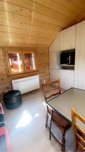 TV a/nebo společenská místnost v ubytování Nid de nature