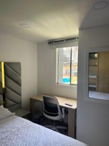 Postel nebo postele na pokoji v ubytování Habitación en apartamento Robledo-Medellin