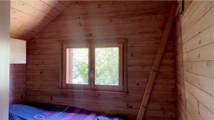 Postel nebo postele na pokoji v ubytování Nid de nature