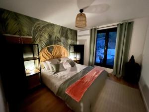 a bedroom with a large bed and a large window at Cabine27 in Sausset-les-Pins
