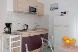 Kuchyň nebo kuchyňský kout v ubytování Apartments Family Gligora