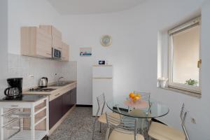 Kuchyň nebo kuchyňský kout v ubytování Apartments Family Gligora