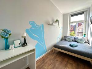 Postel nebo postele na pokoji v ubytování MMRent Lady Blue Room