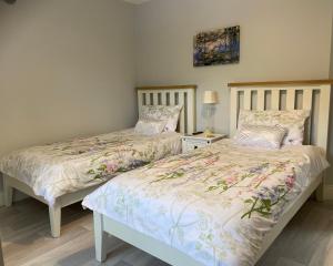 Voodi või voodid majutusasutuse Laurel Lodge toas
