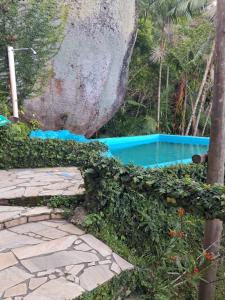 Bazén v ubytování Chale Tupi nebo v jeho okolí