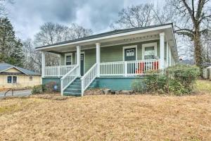 a small green house with a white porch and stairs at Private Oasis (1bdr/1bth) AVIS Discount Available in Atlanta