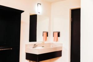 a bathroom with a sink and a mirror at Maxihotel Business Class Culiacan in Culiacán +20 photos
