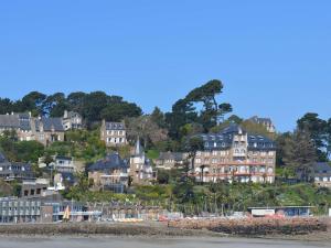 a group of houses on top of a hill at Appartement 3 étoiles avec Wifi à Perros-Guirec - FR-1-542-42 in Perros-Guirec +2 photos