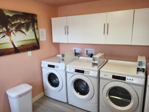 a laundry room with two washer and dryer at Tiny Home By The Beach in Blaine