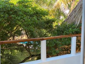 a view from the balcony of a house with trees at Villa SOL in Cumayasa Kilómetros 4 1/2