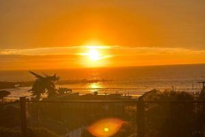 迈滕西约Cabañas El Bosque的日落和日落