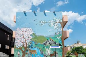 a mural on the side of a building at Iasmos Luxury Apartment in Heraklio