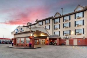 a rendering of a hotel in a parking lot at Best Western Grande Prairie in Grande Prairie