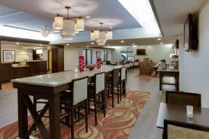 a large dining room with a long table and chairs at Hampton Inn Gettysburg in Gettysburg