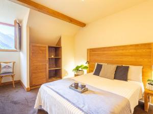 Posteľ alebo postele v izbe v ubytovaní Appartement de 70 m² au centre-ville avec piscine, hammam, sauna et balcon bien exposé - FR-1-296-392