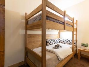 Posteľ alebo postele v izbe v ubytovaní Appartement de 70 m² au centre-ville avec piscine, hammam, sauna et balcon bien exposé - FR-1-296-392