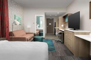 TV a/nebo společenská místnost v ubytování Home2 Suites By Hilton Columbus Polaris