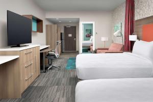 TV a/nebo společenská místnost v ubytování Home2 Suites By Hilton Columbus Polaris