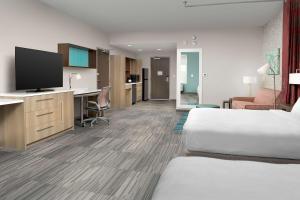 TV a/nebo společenská místnost v ubytování Home2 Suites By Hilton Columbus Polaris