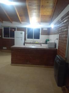 Kuchyň nebo kuchyňský kout v ubytování Quovadis apartamento