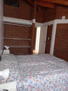 Postel nebo postele na pokoji v ubytování Quovadis apartamento