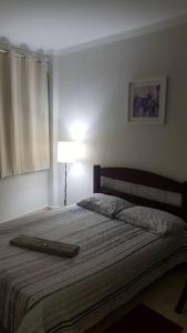 Posteľ alebo postele v izbe v ubytovaní Studio 501 Campinas SP