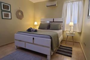 Postel nebo postele na pokoji v ubytování Great Location &equipped apartment