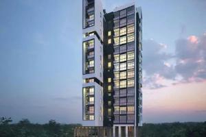 un edificio alto con muchas ventanas al atardecer en Momentus Serviced Residences Novena en Singapur