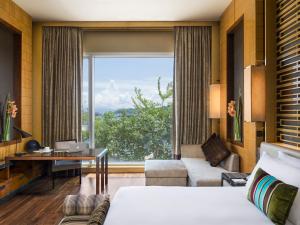 Llit o llits en una habitació de The Olympian Hong Kong