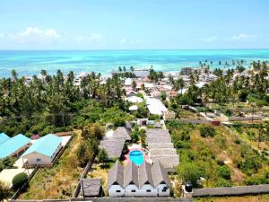 an aerial view of a resort with the ocean at Mkeka Spice Lodge Jambiani in Jambiani