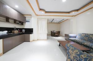 Ruang duduk di 2 Wide Bedroom Unit with Breakfast for 2pax