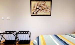 Postel nebo postele na pokoji v ubytování Vivi's Home