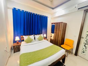 Postel nebo postele na pokoji v ubytování Hotel Park Pride Pitampura New Delhi, Couple Friendly