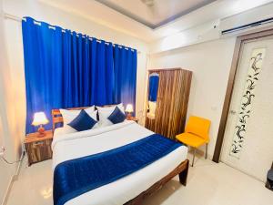 Postel nebo postele na pokoji v ubytování Hotel Park Pride Pitampura New Delhi, Couple Friendly