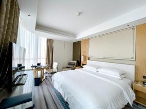 淄博喜来登酒店 客房内的一张或多张床位