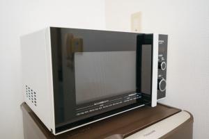 TV in/ali zabaviščno središče v nastanitvi BURan House